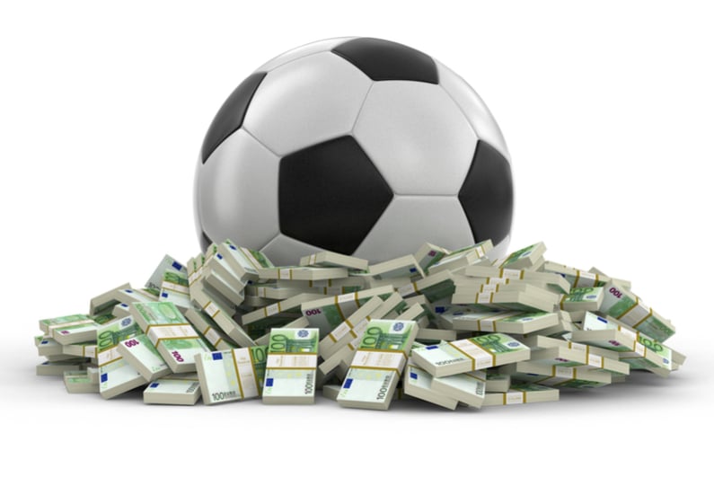 Soccer football with dollars