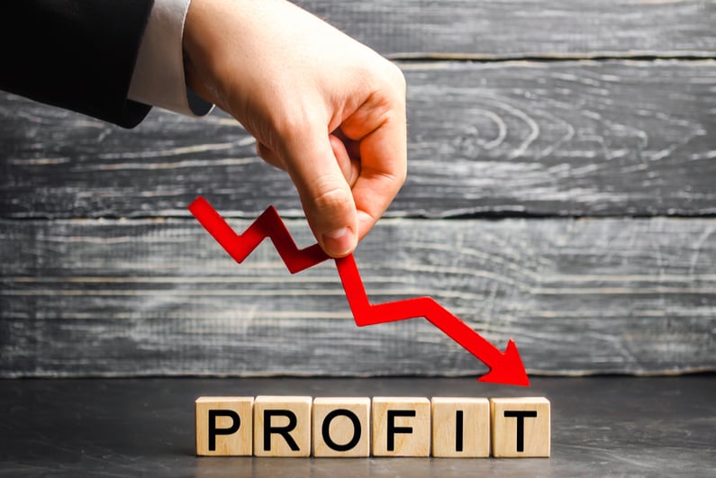 Red arrow shows profit going down